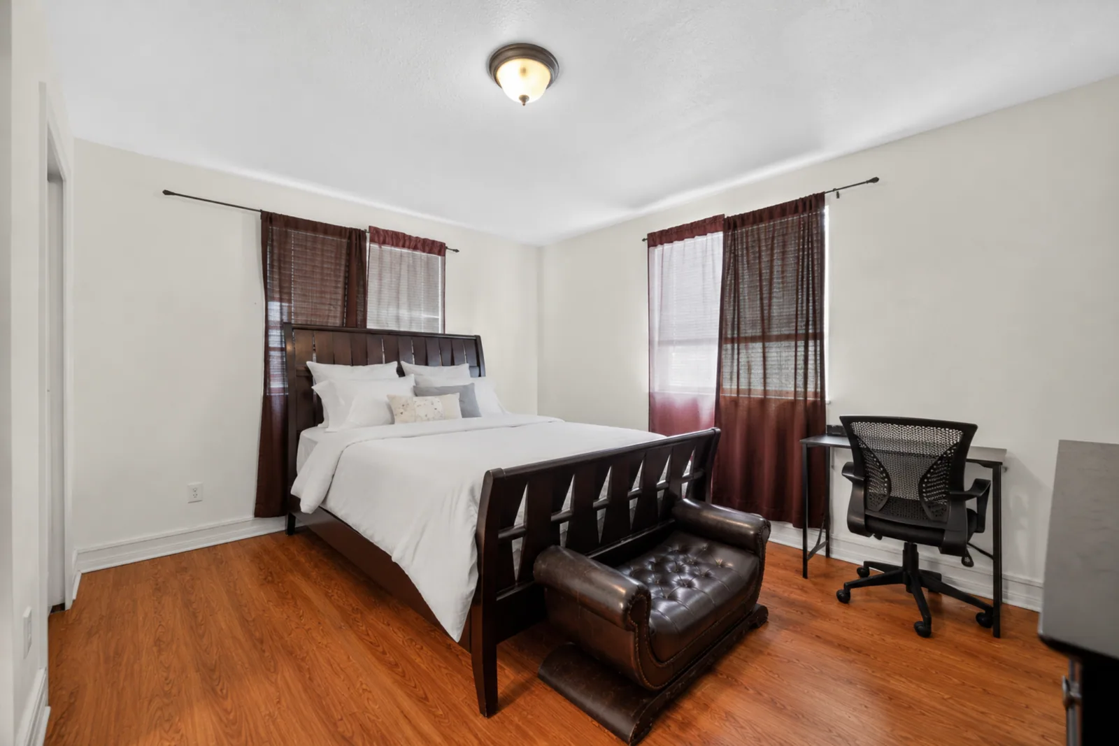 Furnished bedroom with a desk in an Avenir-managed co-living property