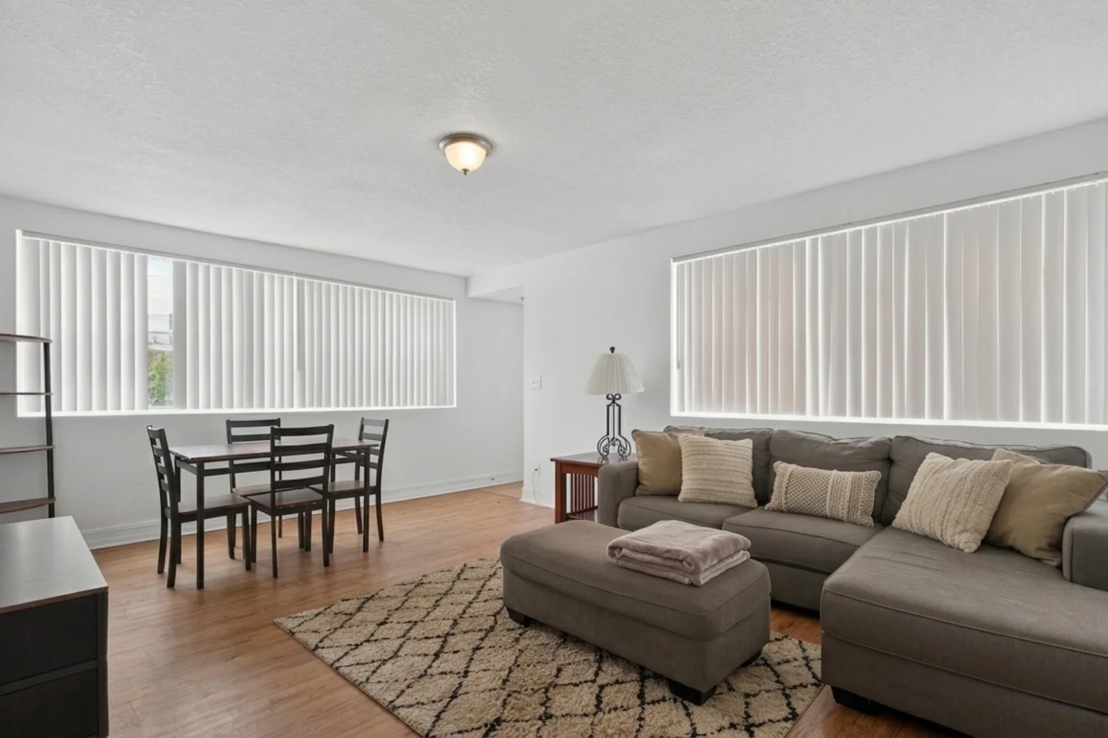 Living room with a sectional sofa in an Avenir-managed co-living property