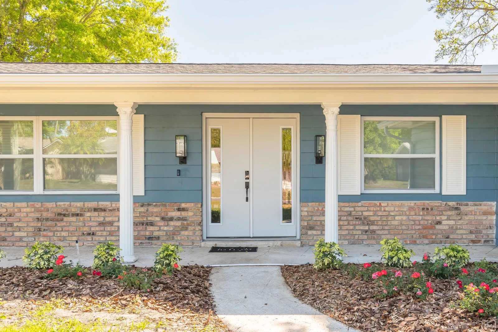 Front entrance of a single-family home at an Avenir-operated Florida rental property