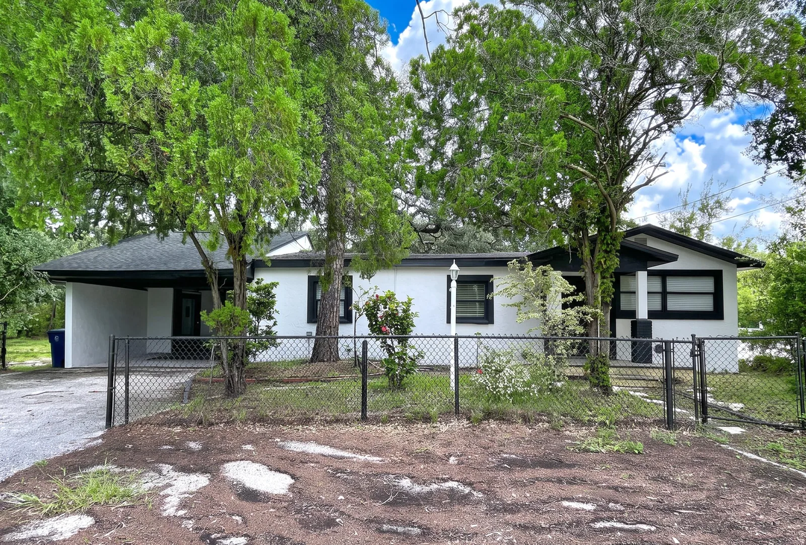 Fenced single-family home exterior in an Avenir-managed co-living property